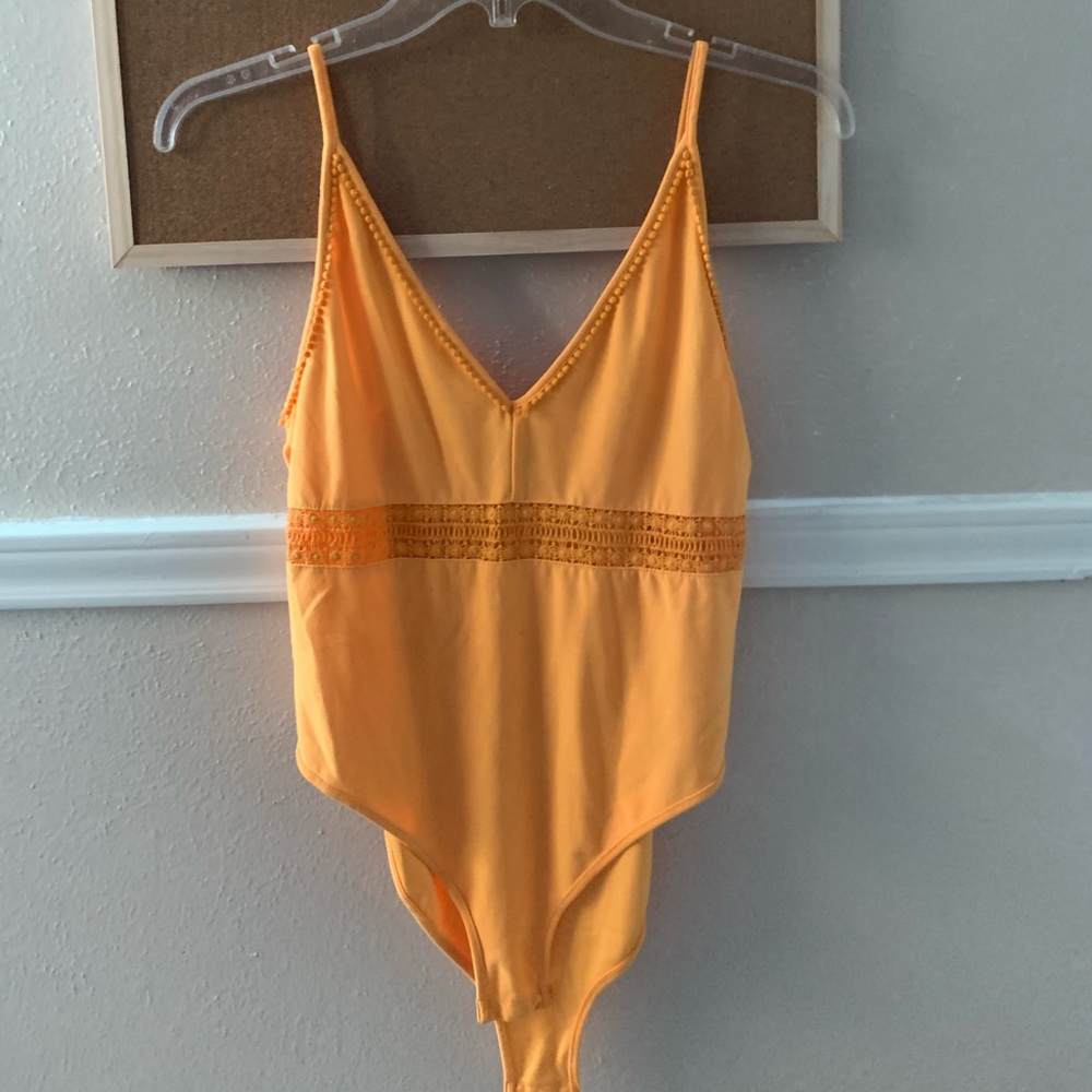 Gold body suit